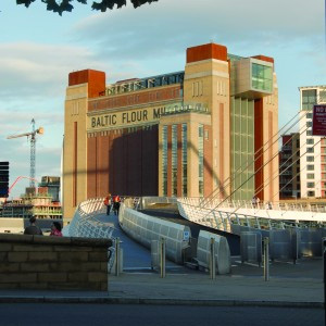 Exterior of the Baltic building including part of the Millennium Bridge in the foreground